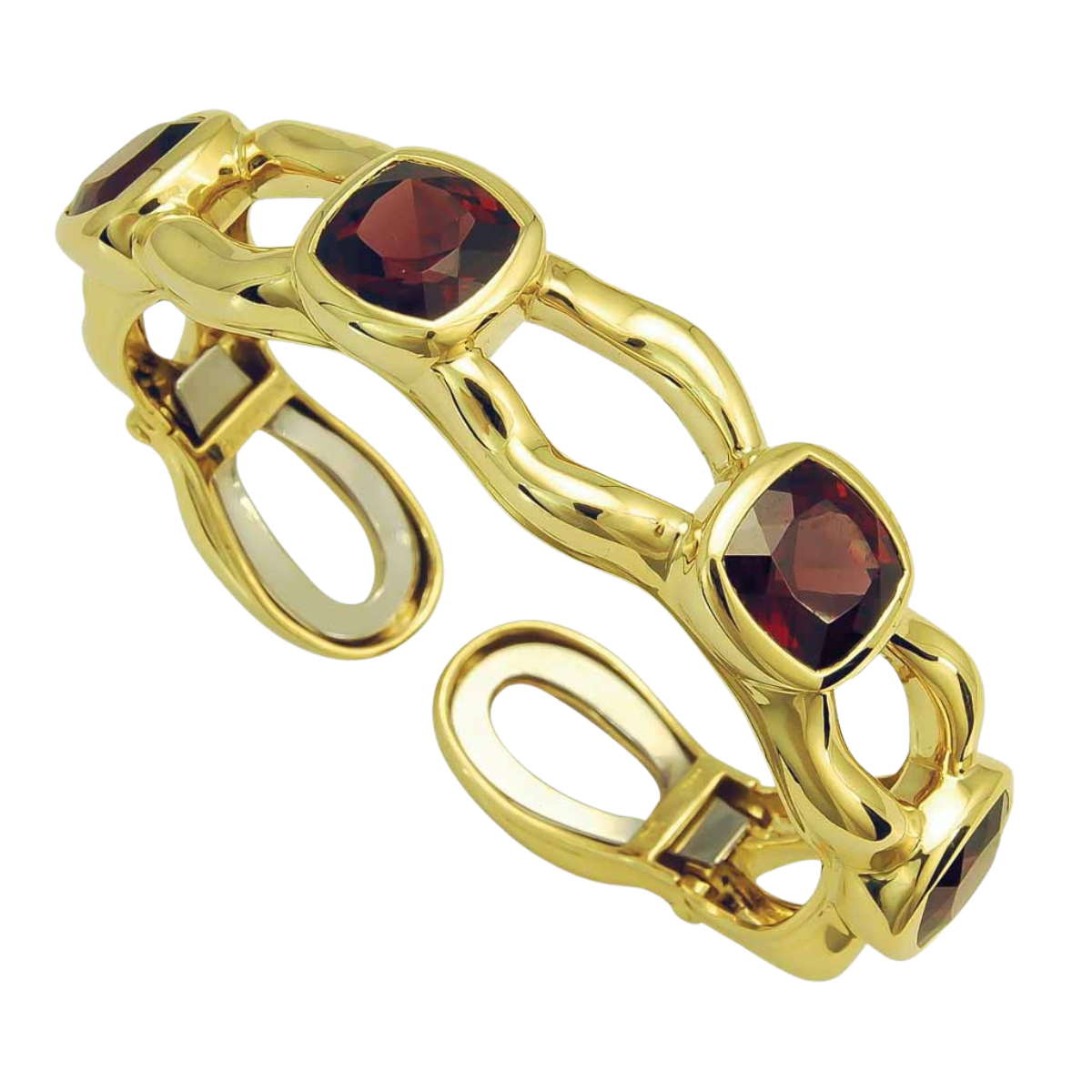 18939 Tsarina Rhodolite Clip Bangle Designed & Handmade by Kaufmann de Suisse in 18kt Yellow Gold featuring 4 Cushion cut Rhodolite Garnets weighing a total of 21.04cts