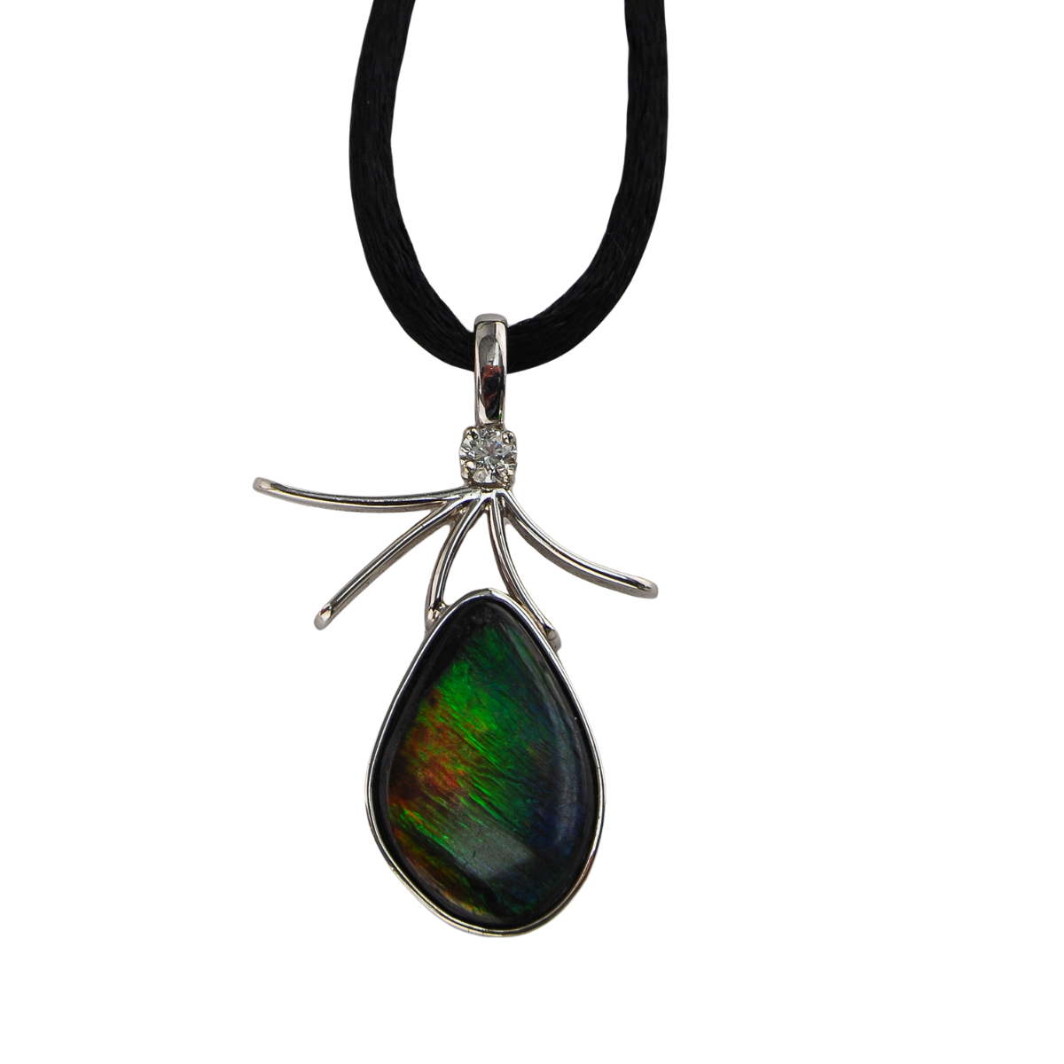 19983 Amolite Pendant Designed and Handmade by Kaufmann de Suisse in 18kt White Gold featuring 1 Oval Cut Amolite weighing 5.34cts and 1 Round Brilliant Cut FVVS Qulity