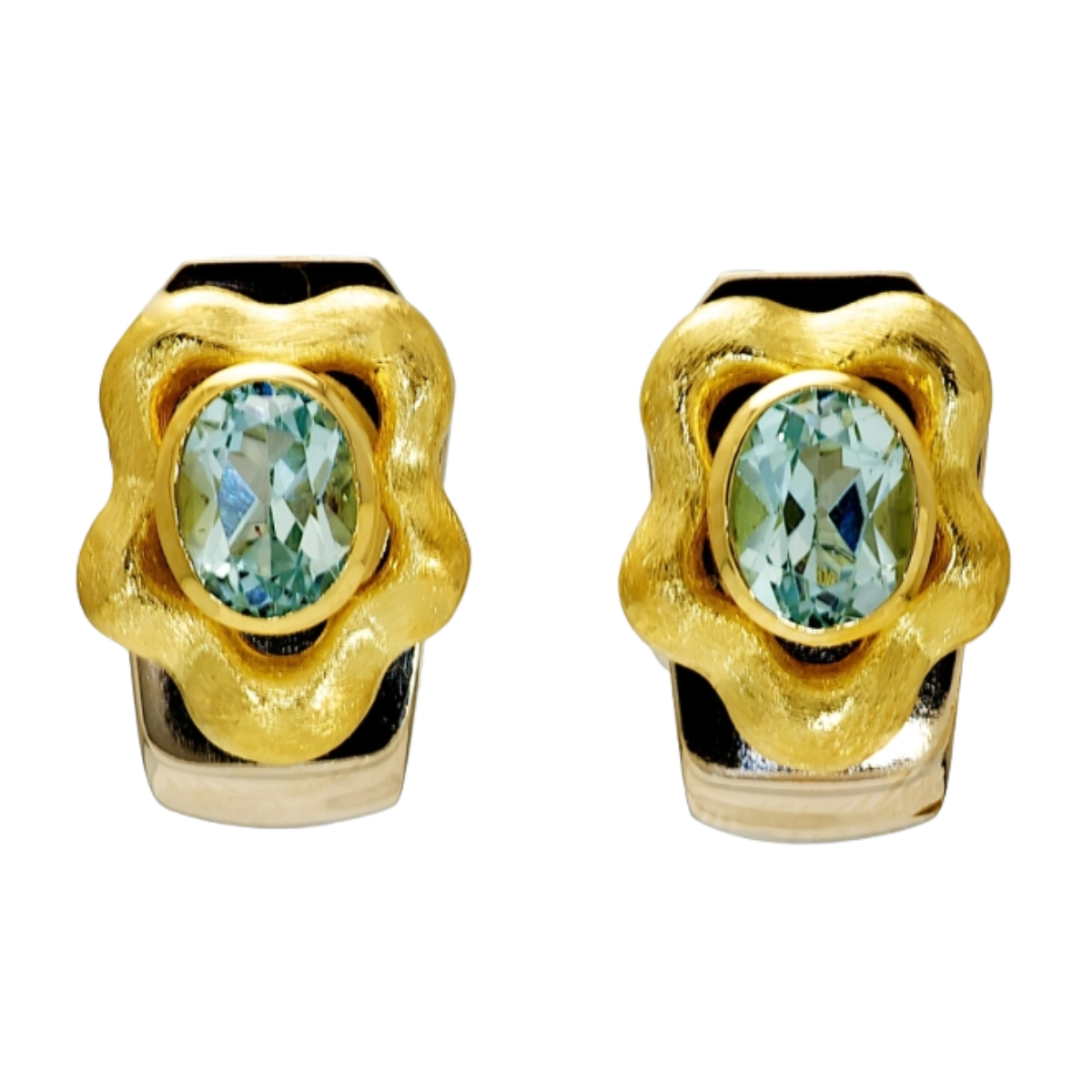 20962 Callista Clip Blue Topaz Earclips Designed & Handmade by Kaufmann de Suisse in Stainless Steel and 18kt Yellow Gold featuring 2 Oval Blue Topaz weighing a total of 3.30cts