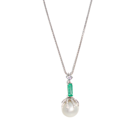 24074 South Sea Pearl Pendant Designed and Handmade in 18kt White Gold featuring one South Sea Pearl measuring 13mm, 1 Emerald Cut Emerald weighing