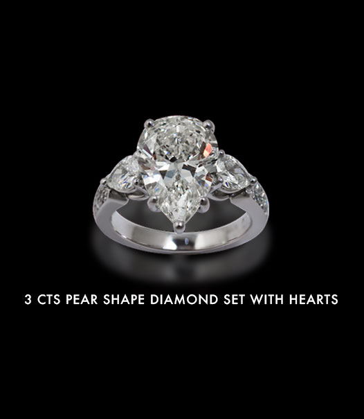 3CTS-PEAR-SHAPE-DIAMOND-SET-WITH-HEARTS-3.jpg