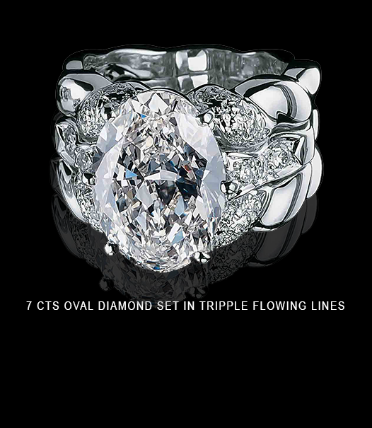 7-CTS-OVAL-DIAMOND-SET-IN-TRIPPLE-FLOWING-LINES.png